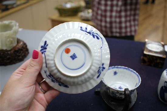 A Chinese blue and white tea bowl and saucer and two jars, Kangxi, some damage, largest diameter 11cm